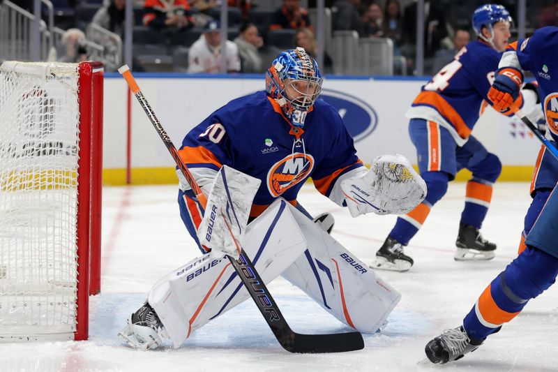 Dec 2, 2025; Elmont, New York, USA; New York Islanders goaltender Ilya Sorokin (30) tends net against the Tampa Bay Lightning during the first period at UBS Arena. Mandatory Credit: Brad Penner-Imagn Images