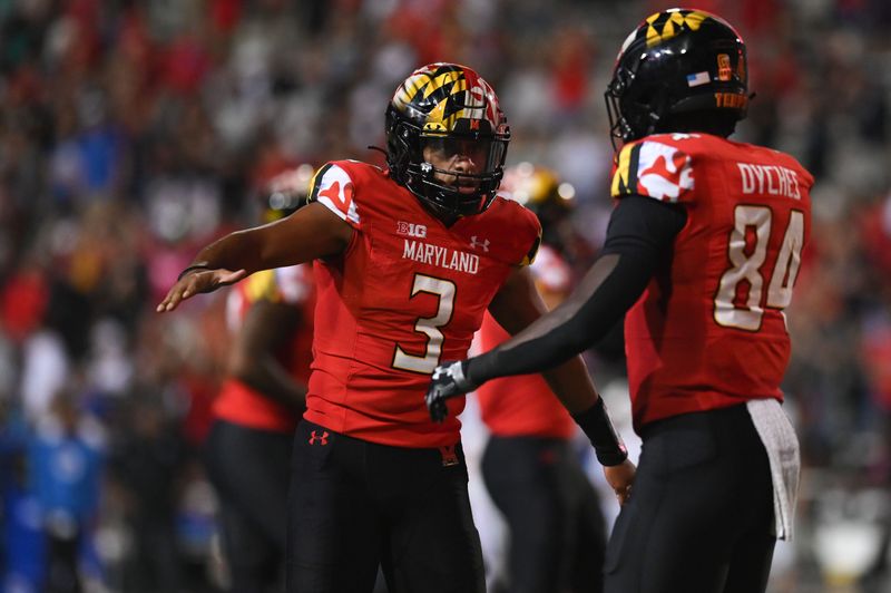 Sep 17, 2022; College Park, Maryland, USA; Maryland Terrapins tight end Corey Dyches (84) celebrates with quarterback Taulia Tagovailoa (3) after scoring a second half touchdown against the Southern Methodist Mustangs  at Capital One Field at Maryland Stadium. Mandatory Credit: Tommy Gilligan-USA TODAY Sports