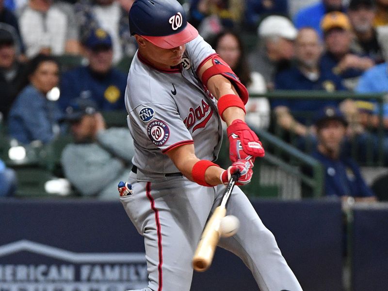 Sep 15, 2023; Milwaukee, Wisconsin, USA; Washington Nationals center fielder Alex Call (17) hits a double against the Milwaukee Brewers in the sixth inning at American Family Field. Mandatory Credit: Michael McLoone-USA TODAY Sports