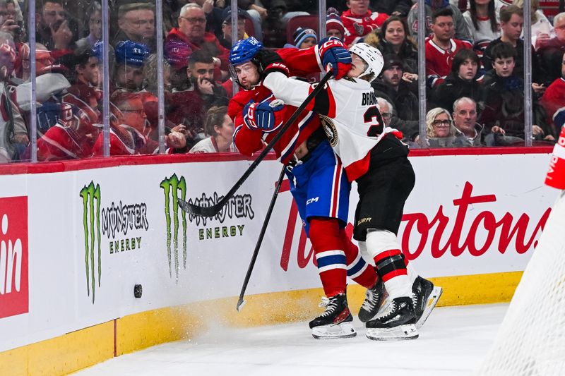 Jan 23, 2024; Montreal, Quebec, CAN; Ottawa Senators defenseman Erik Brannstrom (26) checks Montreal Canadiens right wing Josh Anderson (17) into the boards during the second period at Bell Centre. Mandatory Credit: David Kirouac-USA TODAY Sports