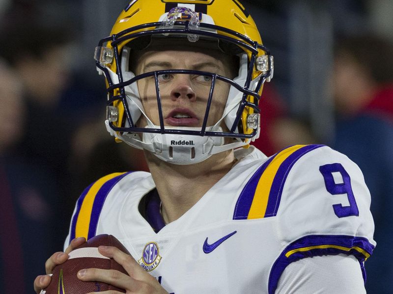 Nov 16, 2019; Oxford, MS, USA; LSU Tigers quarterback Joe Burrow (9) warms up before the game against the Mississippi Rebels at Vaught-Hemingway Stadium. Mandatory Credit: Justin Ford-USA TODAY Sports