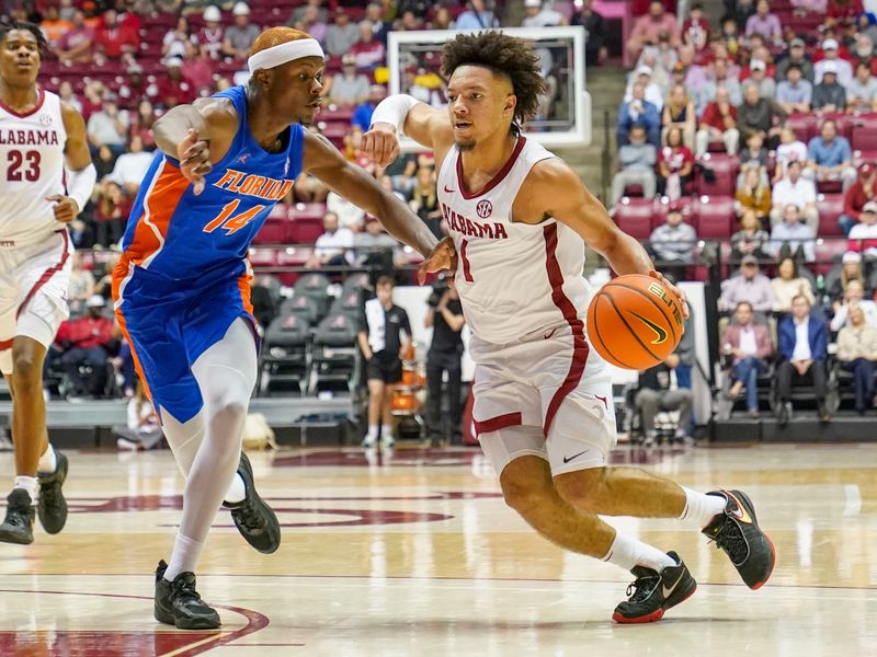 Feb 8, 2023; Tuscaloosa, Alabama, USA; Alabama Crimson Tide guard Mark Sears (1) drives to the basket against Florida Gators guard Kowacie Reeves (14) during the second half at Coleman Coliseum. Mandatory Credit: Marvin Gentry-USA TODAY Sports