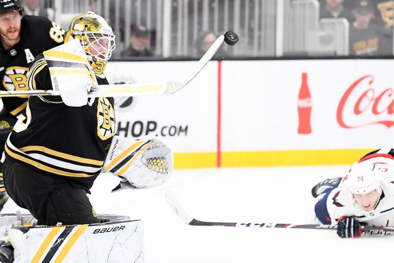 Oct 3, 2023; Boston, Massachusetts, USA; Boston Bruins goaltender Linus Ullmark (35) makes a save during overtime against the Washington Capitals at TD Garden. Mandatory Credit: Bob DeChiara-USA TODAY Sports