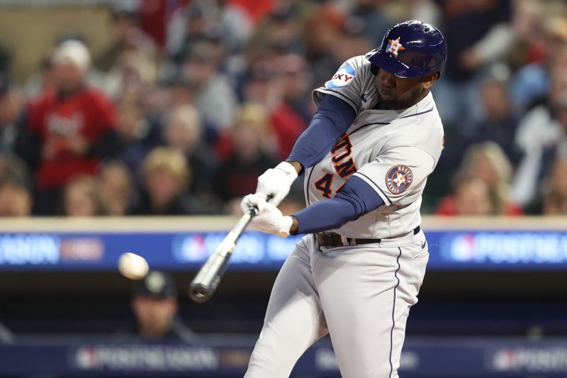 Oct 11, 2023; Minneapolis, Minnesota, USA; Houston Astros left fielder Yordan Alvarez (44) hits a single in the fourth inning against the Minnesota Twins during game four of the ALDS for the 2023 MLB playoffs at Target Field. Mandatory Credit: Jesse Johnson-USA TODAY Sports