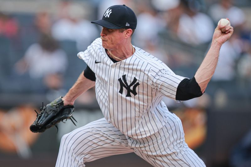 Jul 6, 2024; Bronx, New York, USA; New York Yankees relief pitcher Tim Hill (54) delivers a pitch during the sixth inning against the Boston Red Sox at Yankee Stadium. Mandatory Credit: Vincent Carchietta-USA TODAY Sports