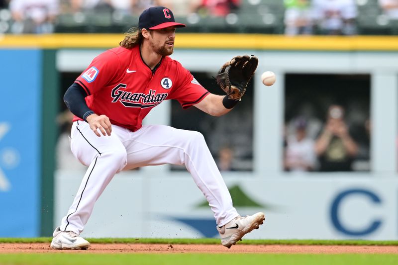 Jun 2, 2024; Cleveland, Ohio, USA; Cleveland Guardians second baseman Daniel Schneemann (10) fields a ball hit by Washington Nationals second baseman Luis Garcia Jr. (not pictured) during the first inning at Progressive Field. Mandatory Credit: Ken Blaze-USA TODAY Sports