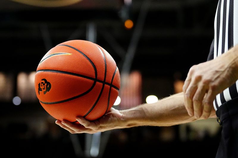 Feb 5, 2023; Boulder, Colorado, USA; Detailed view of a NCAA referee holding a Nike branded Colorado Buffaloes basketball in the first half against the Stanford Cardinal at the CU Events Center. Mandatory Credit: Ron Chenoy-USA TODAY Sports