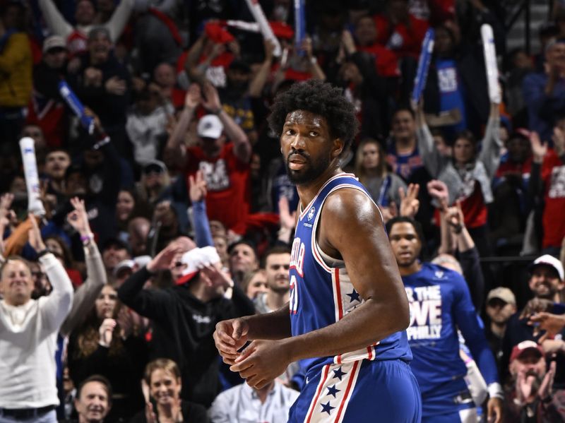 PHILADELPHIA, PA - APRIL 25: Joel Embiid #21 of the Philadelphia 76ers celebrates a three point basket during the game against the New York Knicks during Round 1 Game 3 of the 2024 NBA Playoffs on April 25, 2024 at the Wells Fargo Center in Philadelphia, Pennsylvania NOTE TO USER: User expressly acknowledges and agrees that, by downloading and/or using this Photograph, user is consenting to the terms and conditions of the Getty Images License Agreement. Mandatory Copyright Notice: Copyright 2024 NBAE (Photo by David Dow/NBAE via Getty Images)