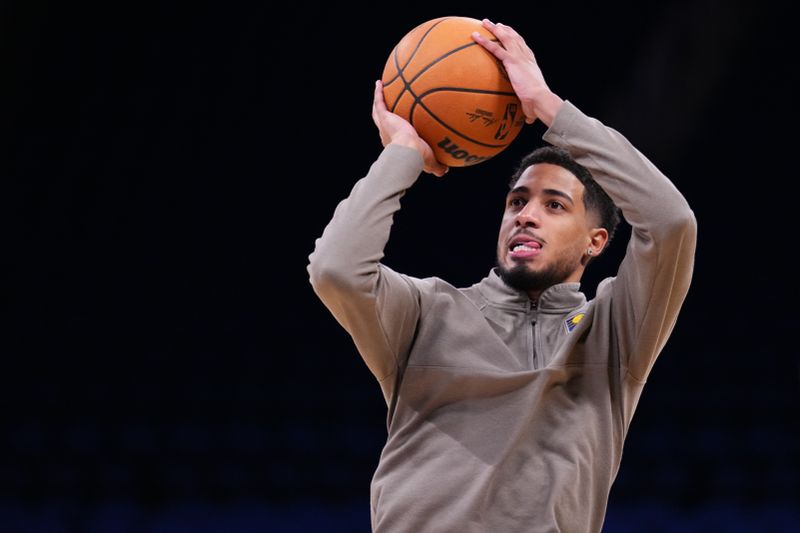 ORLANDO, FLORIDA - OCTOBER 28: Tyrese Haliburton #0 of the Indiana Pacers warms up prior to a game against the Orlando Magic at Kia Center on October 28, 2024 in Orlando, Florida.  NOTE TO USER: User expressly acknowledges and agrees that, by downloading and or using this photograph, User is consenting to the terms and conditions of the Getty Images License Agreement.  (Photo by Rich Storry/Getty Images)