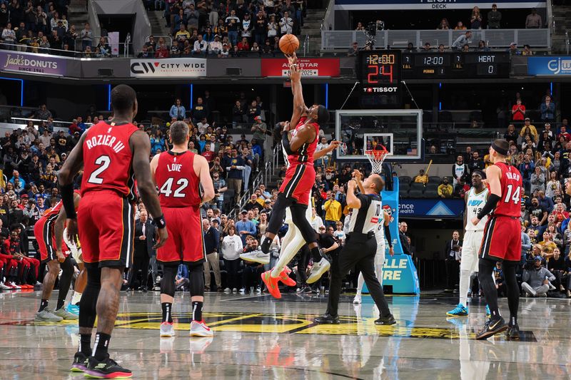 INDIANAPOLIS, IN - NOVEMBER 17: Bam Adebayo #13 of the Miami Heat takes ip off during the game against the Indiana Pacers on November 17, 2024 at Gainbridge Fieldhouse in Indianapolis, Indiana. NOTE TO USER: User expressly acknowledges and agrees that, by downloading and or using this Photograph, user is consenting to the terms and conditions of the Getty Images License Agreement. Mandatory Copyright Notice: Copyright 2024 NBAE (Photo by Ron Hoskins/NBAE via Getty Images)