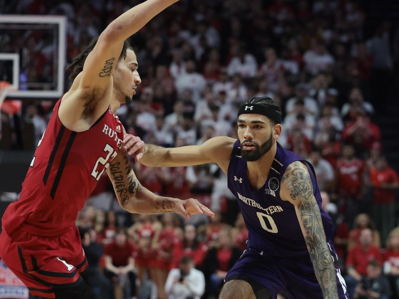 Mar 5, 2023; Piscataway, New Jersey, USA; Northwestern Wildcats guard Boo Buie (0) dribbles against Rutgers Scarlet Knights guard Caleb McConnell (22) during the first half at Jersey Mike's Arena. Mandatory Credit: Vincent Carchietta-USA TODAY Sports