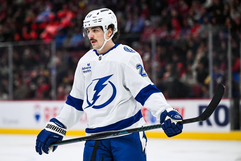 Jan 21, 2025; Montreal, Quebec, CAN; Tampa Bay Lightning center Michael Eyssimont (23) looks on against the Montreal Canadiens during the first period at Bell Centre. Mandatory Credit: David Kirouac-Imagn Images