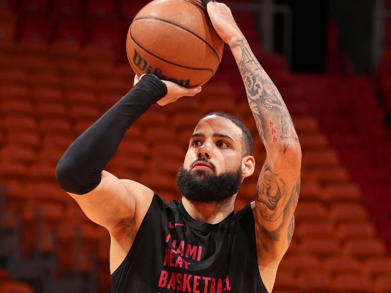 MIAMI, FL - JANUARY 31: Caleb Martin #16 of the Miami Heat warms up against the Sacramento Kings on January 31, 2024 at Kaseya Center in Miami, Florida. NOTE TO USER: User expressly acknowledges and agrees that, by downloading and or using this Photograph, user is consenting to the terms and conditions of the Getty Images License Agreement. Mandatory Copyright Notice: Copyright 2024 NBAE (Photo by Issac Baldizon/NBAE via Getty Images)