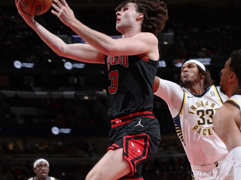 CHICAGO, IL - DECEMBER 6: Josh Giddey #3 of the Chicago Bulls drives to the basket during the game against the Indiana Pacers on December 6, 2024 at United Center in Chicago, Illinois. NOTE TO USER: User expressly acknowledges and agrees that, by downloading and or using this photograph, User is consenting to the terms and conditions of the Getty Images License Agreement. Mandatory Copyright Notice: Copyright 2024 NBAE (Photo by Jeff Haynes/NBAE via Getty Images)