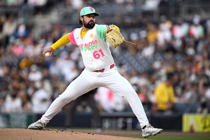 Apr 19, 2024; San Diego, California, USA; San Diego Padres starting pitcher Matt Waldron (61) throws a pitch against the Toronto Blue Jays during the first inning at Petco Park. Mandatory Credit: Orlando Ramirez-USA TODAY Sports 