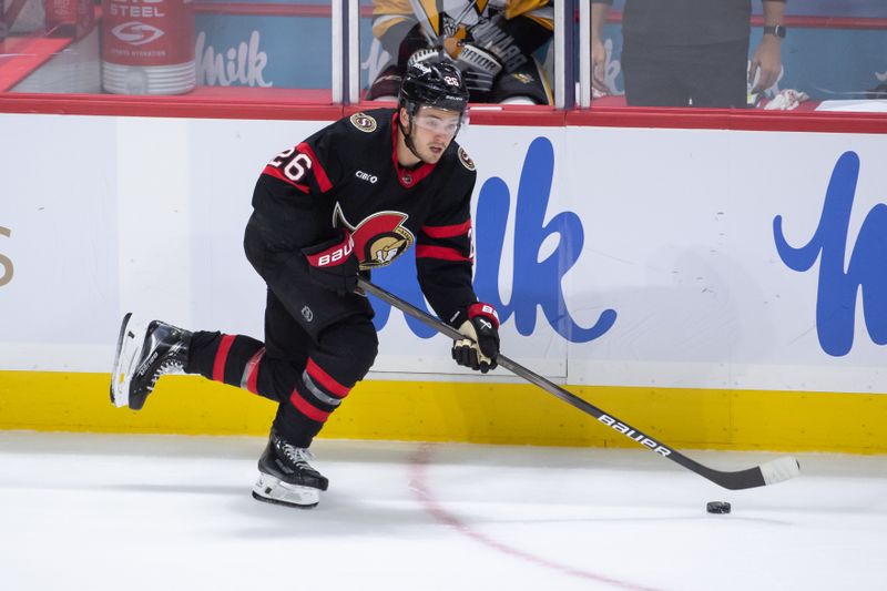 Mar 12, 2024; Ottawa, Ontario, CAN; Ottawa Senators defenseman Erik Brannstrom (26) skates with the puck in the third period against the Pittsburgh Penguins at the Canadian Tire Centre. Mandatory Credit: Marc DesRosiers-USA TODAY Sports