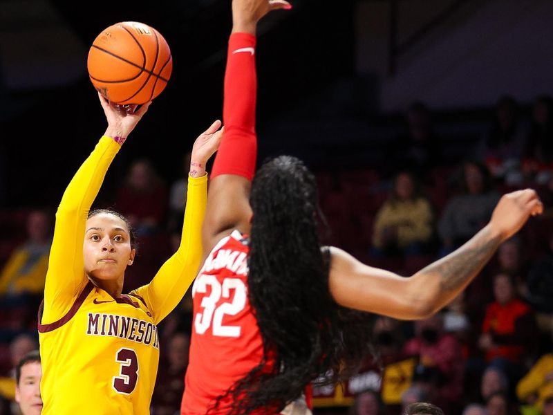 Feb 8, 2024; Minneapolis, Minnesota, USA; Minnesota Golden Gophers guard Amaya Battle (3) shoots as Ohio State Buckeyes forward Cotie McMahon (32) defends during the first half at Williams Arena. Mandatory Credit: Matt Krohn-USA TODAY Sports