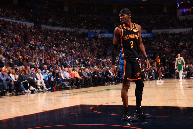 OKLAHOMA CITY, OK - JANUARY 5: Shai Gilgeous-Alexander #2 of the Oklahoma City Thunder looks on during the game against the Boston Celtics on January 5, 2025 at Paycom Center in Oklahoma City, Oklahoma. NOTE TO USER: User expressly acknowledges and agrees that, by downloading and or using this photograph, User is consenting to the terms and conditions of the Getty Images License Agreement. Mandatory Copyright Notice: Copyright 2025 NBAE (Photo by Zach Beeker/NBAE via Getty Images)