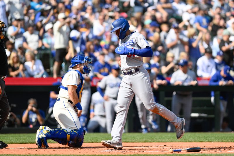 Sep 17, 2023; Seattle, Washington, USA; Los Angeles Dodgers shortstop Amed Rosario (31) scores a run against the Seattle Mariners during the second inning at T-Mobile Park. Mandatory Credit: Steven Bisig-USA TODAY Sports