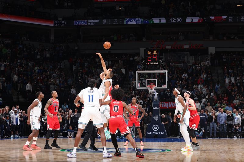 MINNEAPOLIS, MN -  MARCH 31: Rudy Gobert #27 of the Minnesota Timberwolves goes for the tipoff against the Chicago Bulls on March 31, 2024 at Target Center in Minneapolis, Minnesota. NOTE TO USER: User expressly acknowledges and agrees that, by downloading and or using this Photograph, user is consenting to the terms and conditions of the Getty Images License Agreement. Mandatory Copyright Notice: Copyright 2024 NBAE (Photo by David Sherman/NBAE via Getty Images)