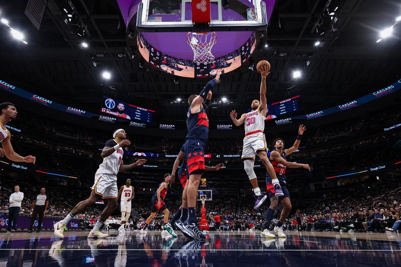 WASHINGTON, DC - NOVEMBER 04: Stephen Curry #30 of the Golden State Warriors goes to the basket against the Washington Wizards during the first half at Capital One Arena on November 04, 2024 in Washington, DC. NOTE TO USER: User expressly acknowledges and agrees that, by downloading and or using this photograph, User is consenting to the terms and conditions of the Getty Images License Agreement. (Photo by Scott Taetsch/Getty Images)