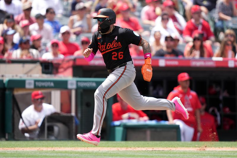 May 11, 2025; Anaheim, California, USA; Baltimore Orioles third baseman Emmanuel Rivera (26) scores in the fifth inning against the Los Angeles Angels at Angel Stadium. Mandatory Credit: Kirby Lee-Imagn Images