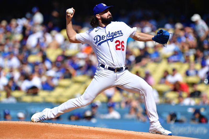 Jun 25, 2023; Los Angeles, California, USA; Los Angeles Dodgers starting pitcher Tony Gonsolin (26) throws against the Houston Astros during the first inning at Dodger Stadium. Mandatory Credit: Gary A. Vasquez-USA TODAY Sports