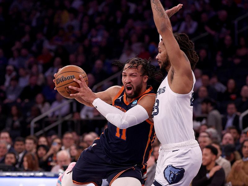 NEW YORK, NEW YORK - FEBRUARY 06:  Jalen Brunson #11 of the New York Knicks heads for the net as Derrick Rose #23 of the Memphis Grizzlies defends in the first half at Madison Square Garden on February 06, 2024 in New York City. NOTE TO USER: User expressly acknowledges and agrees that, by downloading and or using this photograph, User is consenting to the terms and conditions of the Getty Images License Agreement. (Photo by Elsa/Getty Images)