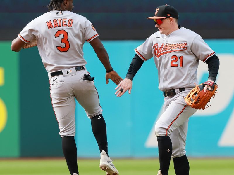 Sep 24, 2023; Cleveland, Ohio, USA; Baltimore Orioles shortstop Jorge Mateo (3) celebrates with left fielder Austin Hayes (21) after defeating the Cleveland Guardians 5-1 at Progressive Field. Mandatory Credit: Aaron Josefczyk-USA TODAY Sports