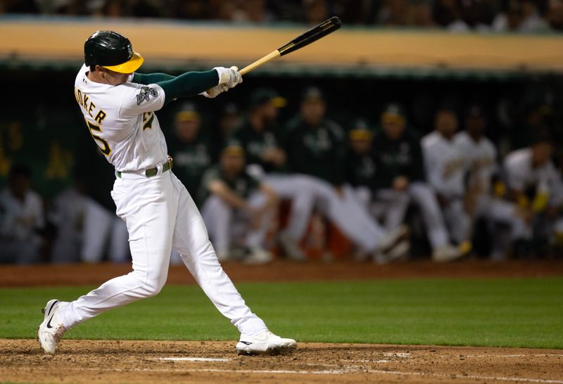 Sep 15, 2023; Oakland, California, USA; Oakland Athletics designated hitter Brent Rooker (25) connects for a solo home run against the San Diego Padres during the sixth inning at Oakland-Alameda County Coliseum. Mandatory Credit: D. Ross Cameron-USA TODAY Sports