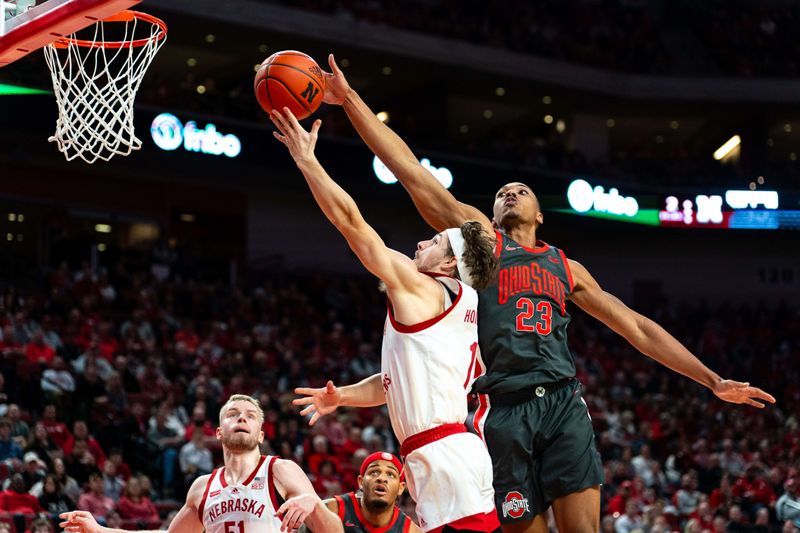 Jan 23, 2024; Lincoln, Nebraska, USA; Ohio State Buckeyes forward Zed Key (23) blocks a shot by Nebraska Cornhuskers guard Sam Hoiberg (1) during the first half at Pinnacle Bank Arena. Mandatory Credit: Dylan Widger-USA TODAY Sports