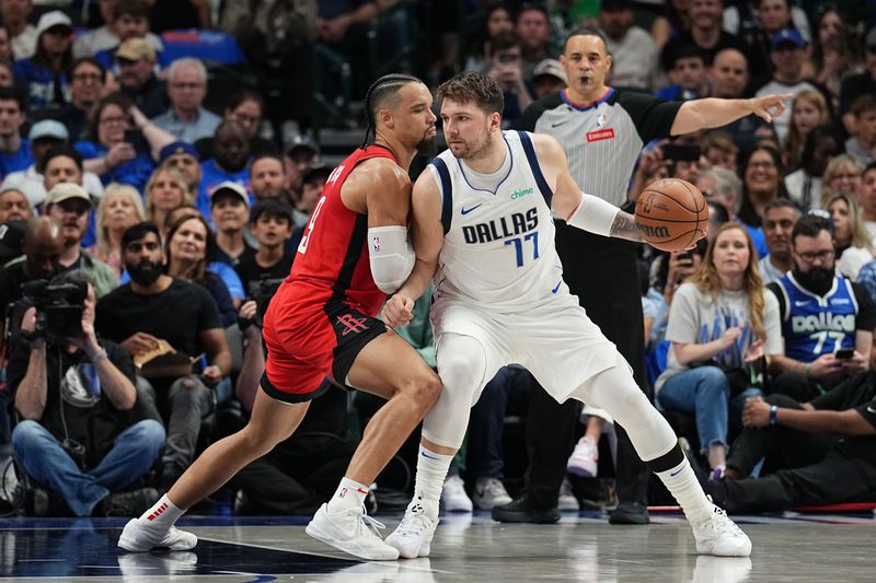 DALLAS, TX - APRIL 7: Luka Doncic #77 of the Dallas Mavericks dribbles the ball during the game against the Houston Rockets  on April 7, 2024 at the American Airlines Center in Dallas, Texas. NOTE TO USER: User expressly acknowledges and agrees that, by downloading and or using this photograph, User is consenting to the terms and conditions of the Getty Images License Agreement. Mandatory Copyright Notice: Copyright 2024 NBAE (Photo by Glenn James/NBAE via Getty Images)