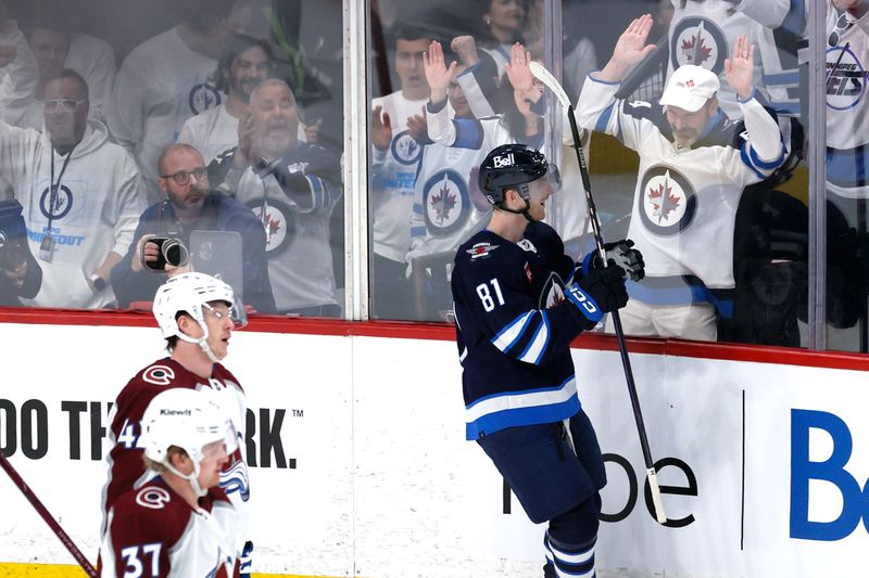 Apr 21, 2024; Winnipeg, Manitoba, CAN; Winnipeg Jets left wing Kyle Connor (81) celebrates his third period goal against the Colorado Avalanche in game one of the first round of the 2024 Stanley Cup Playoffs at Canada Life Centre. Mandatory Credit: James Carey Lauder-USA TODAY Sports