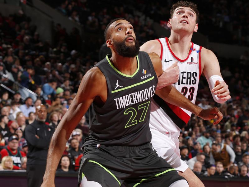 PORTLAND, OR - NOVEMBER 13: Rudy Gobert #27 of the Minnesota Timberwolves boxes out during the game against the Portland Trail Blazers on November 13, 2024 at the Moda Center Arena in Portland, Oregon. NOTE TO USER: User expressly acknowledges and agrees that, by downloading and or using this photograph, user is consenting to the terms and conditions of the Getty Images License Agreement. Mandatory Copyright Notice: Copyright 2024 NBAE (Photo by Cameron Browne/NBAE via Getty Images)