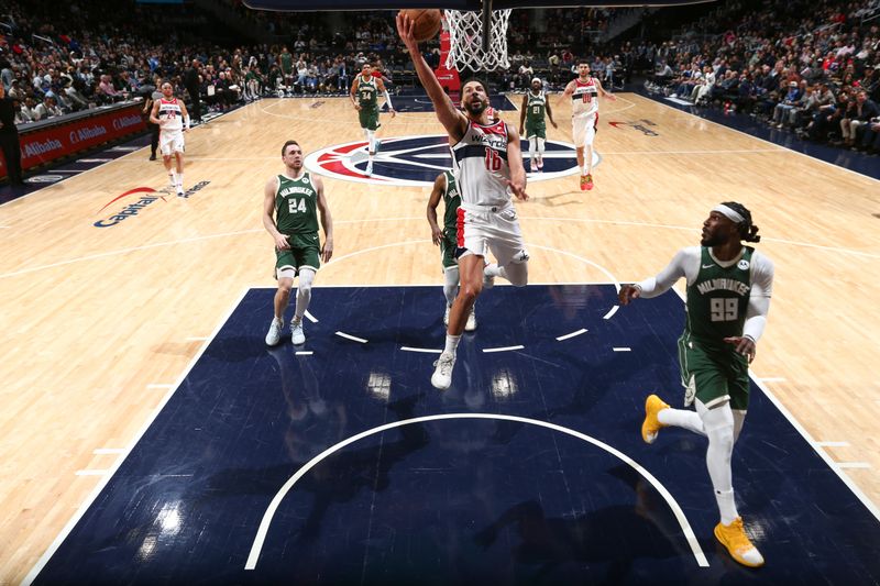 WASHINGTON, DC -? APRIL 2:  Anthony Gill #16 of the Washington Wizards goes to the basket during the game on April 2, 2024 at Capital One Arena in Washington, DC. NOTE TO USER: User expressly acknowledges and agrees that, by downloading and or using this Photograph, user is consenting to the terms and conditions of the Getty Images License Agreement. Mandatory Copyright Notice: Copyright 2024 NBAE (Photo by Kenny Giarla/NBAE via Getty Images)