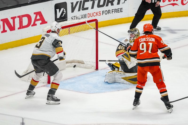 Nov 22, 2025; Anaheim, California, USA; Anaheim Ducks right wing Troy Terry (19) scores against Vegas Golden Knights goaltender Akira Schmid (40) during the second period  at Honda Center. Mandatory Credit: Corinne Votaw-Imagn Images