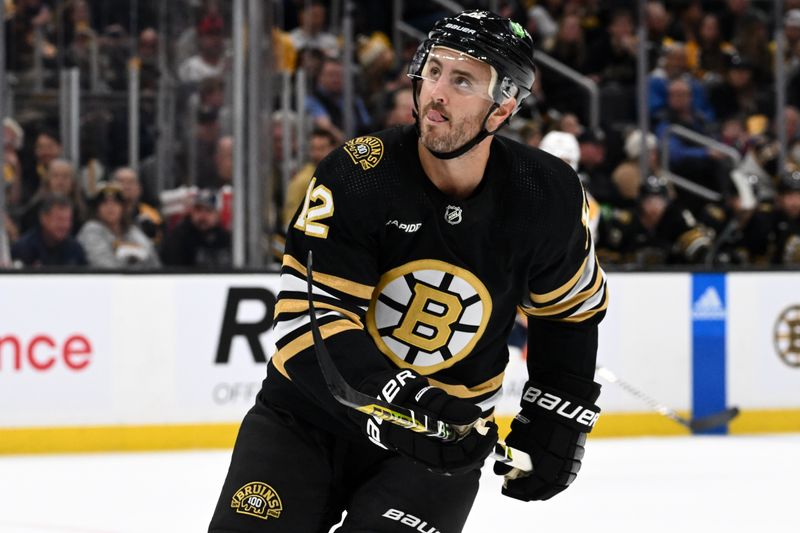 Oct 14, 2023; Boston, Massachusetts, USA; Boston Bruins defenseman Kevin Shattenkirk (12) looks into the crowd during the third period of a game against the Nashville Predators at the TD Garden. Mandatory Credit: Brian Fluharty-USA TODAY Sports