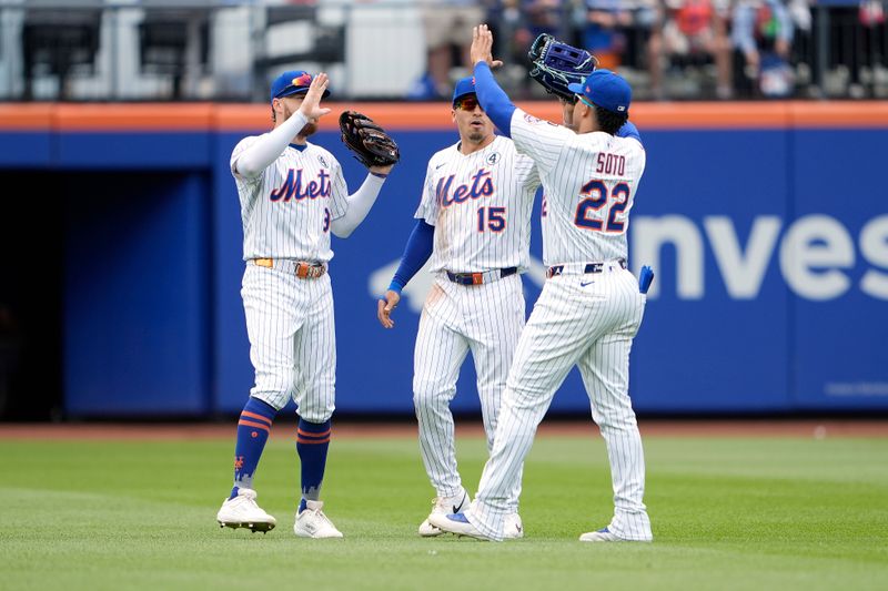 Jun 1, 2025; New York City, New York, USA; New York Mets left fielder Brandon Nimmo (9), center fielder Tyrone Taylor (15), and right fielder Juan Soto (22) celebrate the victory against the Colorado Rockies after the ninth inning at Citi Field. Mandatory Credit: Gregory Fisher-Imagn Images