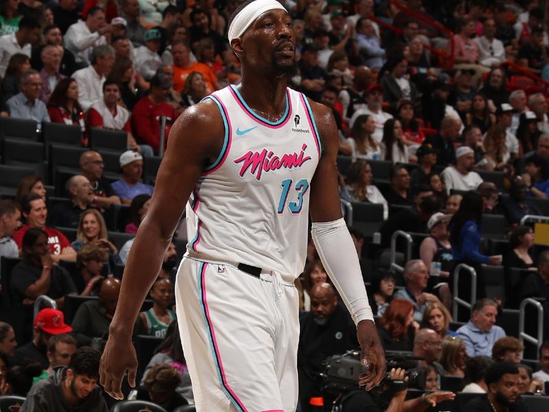 MIAMI, FL - FEBRUARY 10:  Bam Adebayo #13 of the Miami Heat looks on during the game against the Boston Celtics on February 10, 2025 at Kaseya Center in Miami, Florida. NOTE TO USER: User expressly acknowledges and agrees that, by downloading and or using this Photograph, user is consenting to the terms and conditions of the Getty Images License Agreement. Mandatory Copyright Notice: Copyright 2025 NBAE (Photo by Issac Baldizon/NBAE via Getty Images)