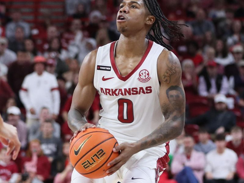 Dec 21, 2023; Fayetteville, Arkansas, USA; Arkansas Razorbacks guard Khalif Battle (0) gets set to shoot a three point shot in the second half against the Abilene Christian Wildcats at Bud Walton Arena. Arkansas won 83-73. Mandatory Credit: Nelson Chenault-USA TODAY Sports