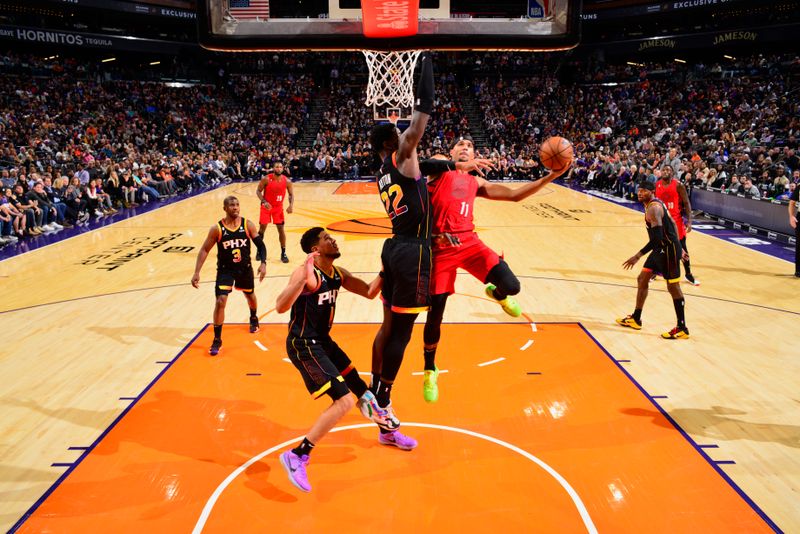 PHOENIX, AZ - NOVEMBER 4: Josh Hart #11 of the Portland Trail Blazers shoots the ball during the game against the Phoenix Suns on November 4, 2022 at Footprint Center in Phoenix, Arizona. NOTE TO USER: User expressly acknowledges and agrees that, by downloading and or using this photograph, user is consenting to the terms and conditions of the Getty Images License Agreement. Mandatory Copyright Notice: Copyright 2022 NBAE (Photo by Barry Gossage/NBAE via Getty Images)