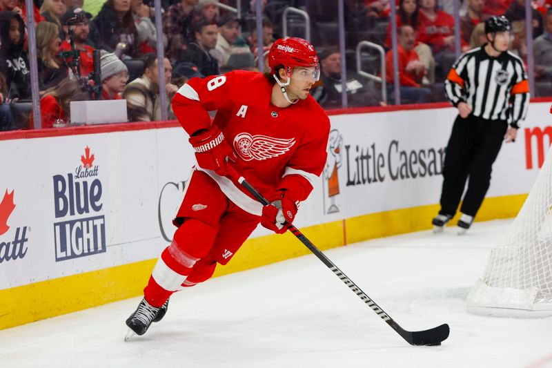 Dec 9, 2023; Detroit, Michigan, USA; Detroit Red Wings defenseman Ben Chiarot (8) handles the puck during the third period at Little Caesars Arena. Mandatory Credit: Brian Bradshaw Sevald-USA TODAY Sports