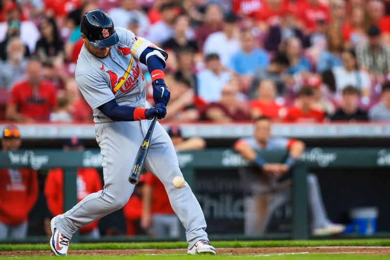 Apr 30, 2025; Cincinnati, Ohio, USA; St. Louis Cardinals first baseman Willson Contreras (40) hits a single in the third inning against the Cincinnati Reds at Great American Ball Park. Mandatory Credit: Katie Stratman-Imagn Images