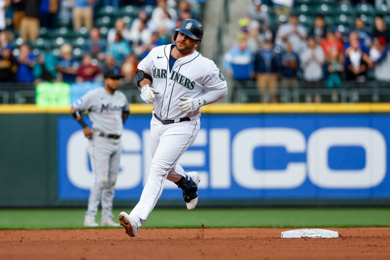 Jun 13, 2023; Seattle, Washington, USA; Seattle Mariners designated hitter Mike Ford (20) runs the bases after hitting a two-run home run against the Miami Marlins during the fourth inning at T-Mobile Park. Mandatory Credit: Joe Nicholson-USA TODAY Sports