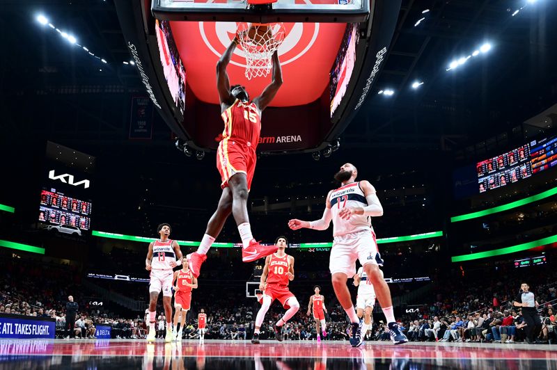 ATLANTA, GA - OCTOBER 28:  Clint Capela #15 of the Atlanta Hawks dunks the ball during the game on October 28, 2024 at State Farm Arena in Atlanta, Georgia.  NOTE TO USER: User expressly acknowledges and agrees that, by downloading and/or using this Photograph, user is consenting to the terms and conditions of the Getty Images License Agreement. Mandatory Copyright Notice: Copyright 2024 NBAE (Photo by Adam Hagy/NBAE via Getty Images)