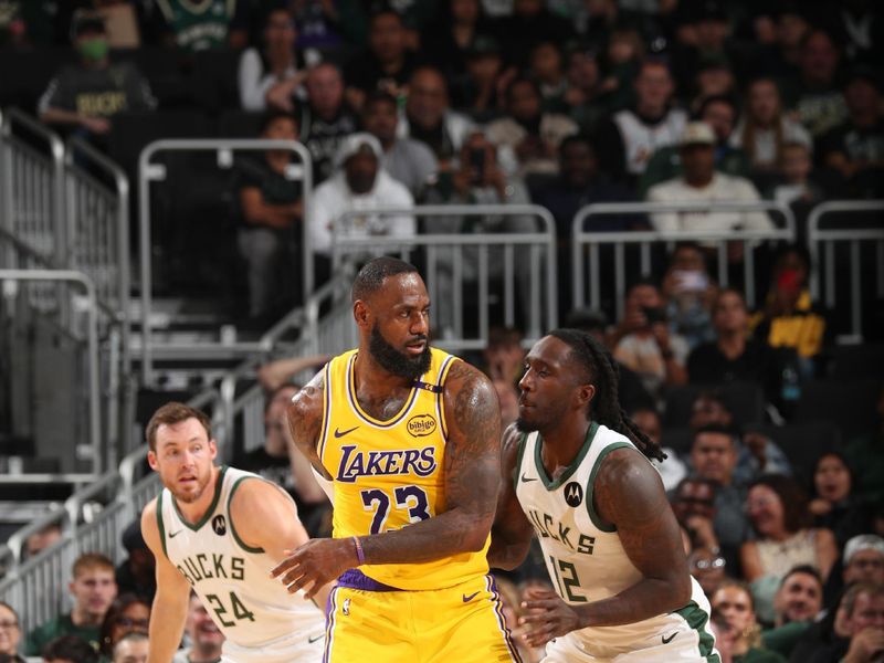 MILWAUKEE, WI - OCTOBER 10: LeBron James #23 of the Los Angeles Lakers passes the ball during the game against the Milwaukee Bucks during a preseason game on October 10, 2024 at Fiserv Forum Center in Milwaukee, Wisconsin. NOTE TO USER: User expressly acknowledges and agrees that, by downloading and or using this Photograph, user is consenting to the terms and conditions of the Getty Images License Agreement. Mandatory Copyright Notice: Copyright 2024 NBAE (Photo by Gary Dineen/NBAE via Getty Images).