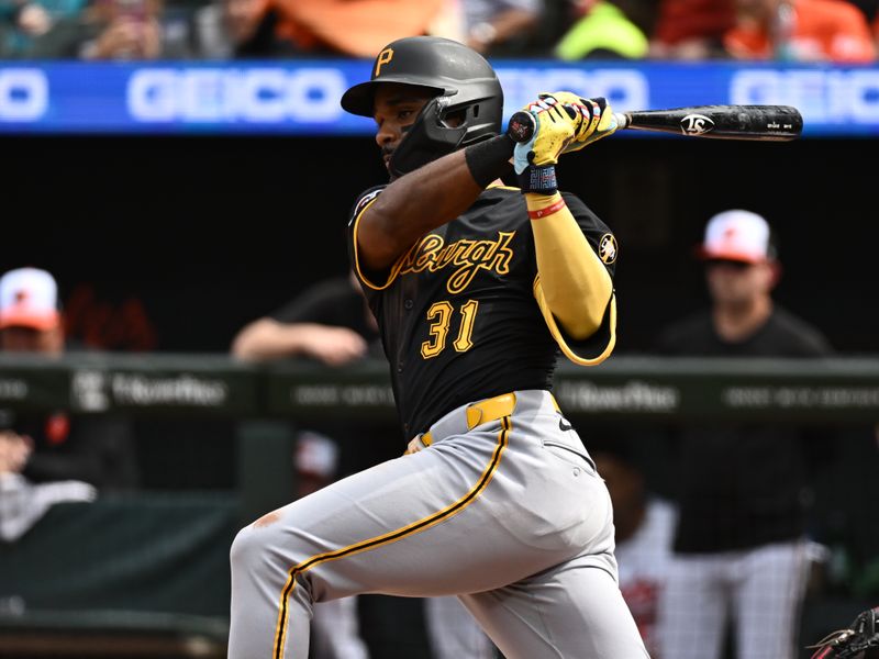 Sep 11, 2025; Baltimore, Maryland, USA;  Pittsburgh Pirates shortstop Liover Peguero (31) singles during the seventh inning against the Baltimore Orioles at Oriole Park at Camden Yards. Mandatory Credit: James A. Pittman-Imagn Images