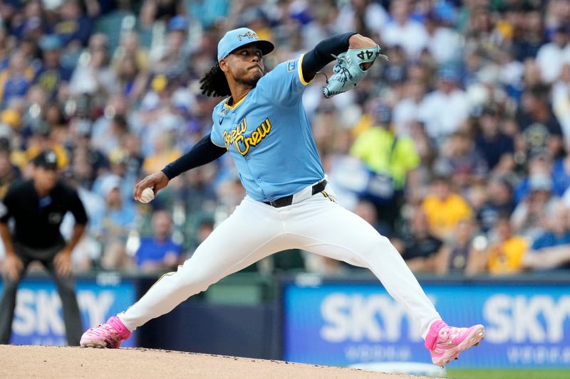 Jul 12, 2024; Milwaukee, Wisconsin, USA;  Milwaukee Brewers pitcher Freddy Peralta (51) throws a pitch during the first inning against the Washington Nationals at American Family Field. Mandatory Credit: Jeff Hanisch-USA TODAY Sports