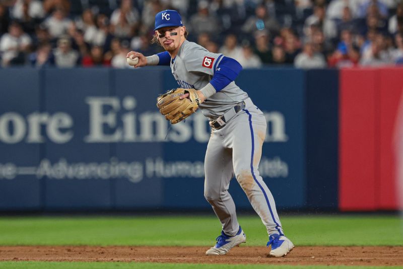 Sep 10, 2024; Bronx, New York, USA; Kansas City Royals shortstop Bobby Witt Jr. (7) throws the ball to first base for an out during the eighth inning against the New York Yankees at Yankee Stadium. Mandatory Credit: Vincent Carchietta-Imagn Images