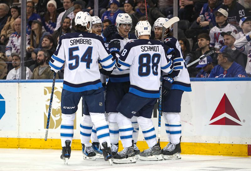 Mar 19, 2024; New York, New York, USA; Winnipeg Jets center Mark Scheifele (55) celebrates his goal against the New York Rangers during the second period at Madison Square Garden. Mandatory Credit: Danny Wild-USA TODAY Sports